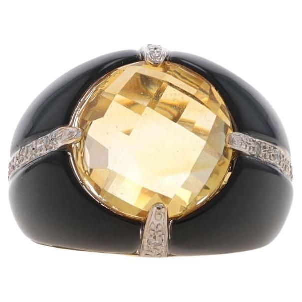 Size: 5 Metal Content: 14k Yellow Gold & 14k White Gold Stone Information Natural Citrine Treatment: Heating Carat(s): 3.45ct Cut: Double Checkerboard Round Color: Yellow Natural Onyx Color: Black Natural Diamonds Carat(s): .06ctw Cut: Single Color: G - H Clarity: SI2 - I1 Total Carats: 3.51ctw Style: Solitaire with Accents Measurements Face Height (north to south): 21/32" (16.1mm) Rise Above Finger: 3/8" (9.4mm) Weight: 6.2 Grams Stamps: 14k Condition: Pre-Owned Professionally cleaned, polished, and tested to guarantee metal content. Onyx Diamond Ring, Onyx Colour, Citrine Ring, La Face, Natural Citrine, Gold Stone, Cocktail Rings, Citrine, Natural Diamonds