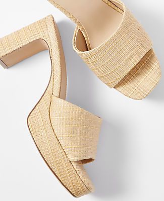 Elevate your style with the Ann Taylor Platform Mule Sandals, a perfect blend of sophistication and comfort. These sandals feature a chic open-toe design and are crafted from a unique mix of materials including 45% cotton, 35% nylon, and 20% jute, offering both durability and breathability. Ideal for the fashion-forward woman, these sandals come in a natural color that complements any outfit.

- Size: 10
- Gender: Female
- Color: Natural
- Material: Cotton, Nylon, Jute blend
- Heel Height: 3 1/4 Chic Synthetic Platform Slippers With Textured Footbed, Chic Open Toe Platform Slippers With Textured Footbed, Spring Open Toe Platform Slippers With Heel Loop, Modern Mules With Textured Footbed For Spring, Spring Open Toe Platform Slippers With Textured Sole, Modern Heels With Textured Footbed And Round Toe, Chic Block Heel Sandals With Textured Sole, Chic Summer Platform Slippers With Stacked Heel, Chic Mules With Textured Footbed And Round Toe