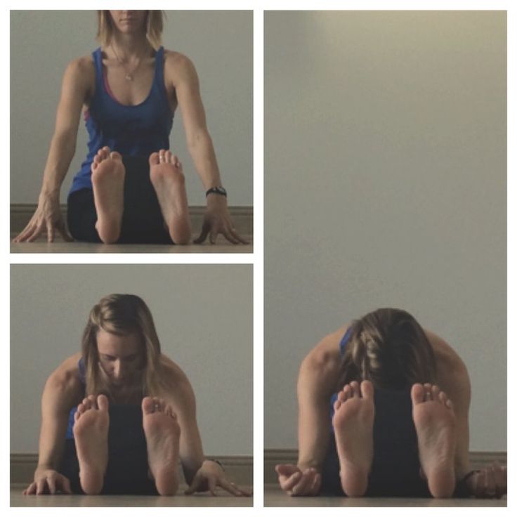 a woman sitting on the floor doing yoga