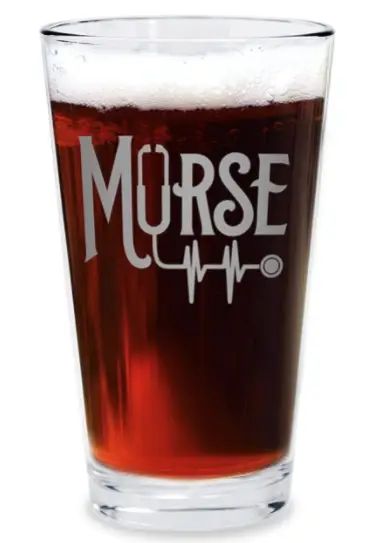 a shot glass filled with beer and the word nurse on it's front side