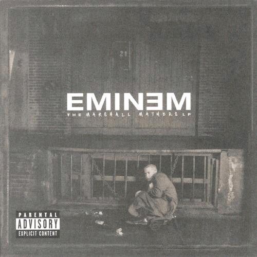 emiem album cover with man sitting on window sill