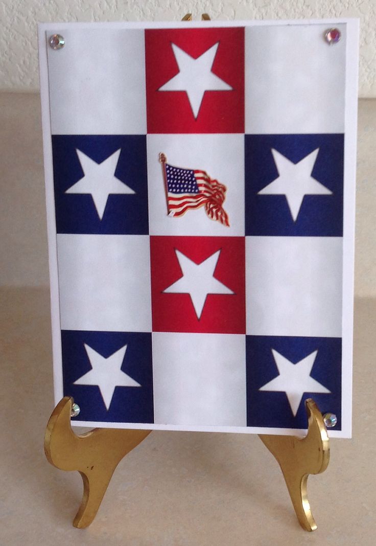 an american flag with stars on it and a gold stand for displaying the state's emblem