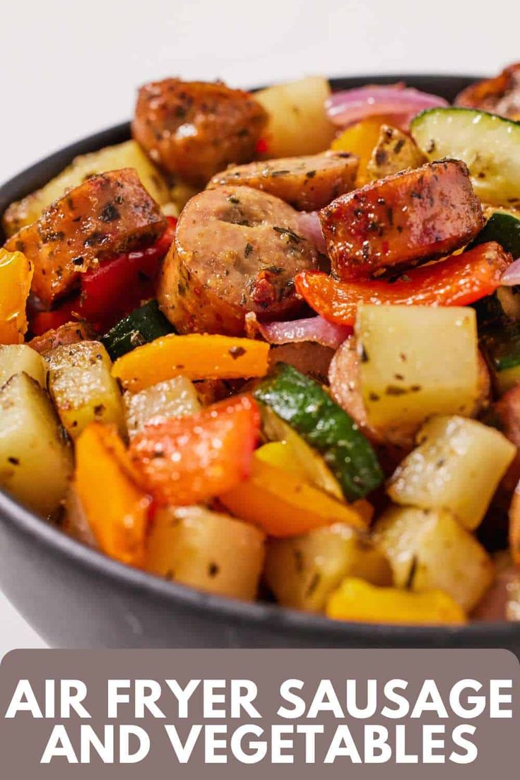 air fryer sausage and veggies in a skillet with text overlay