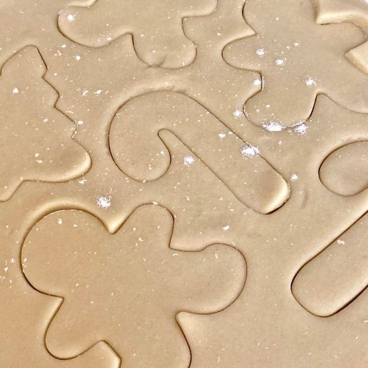 a close up of a cookie sheet with icing on it