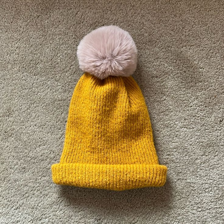 Never Worn. Mustard/Golden Yellow With Pale Pink Puff Ball On Top. Gigi Pip, Golden Yellow, Winter Hat, Pale Pink, Mustard, Winter Hats, Women Accessories, Hats, Yellow