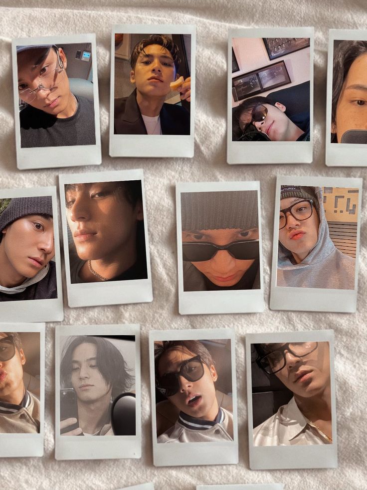 many polaroid photos are arranged on a sheet