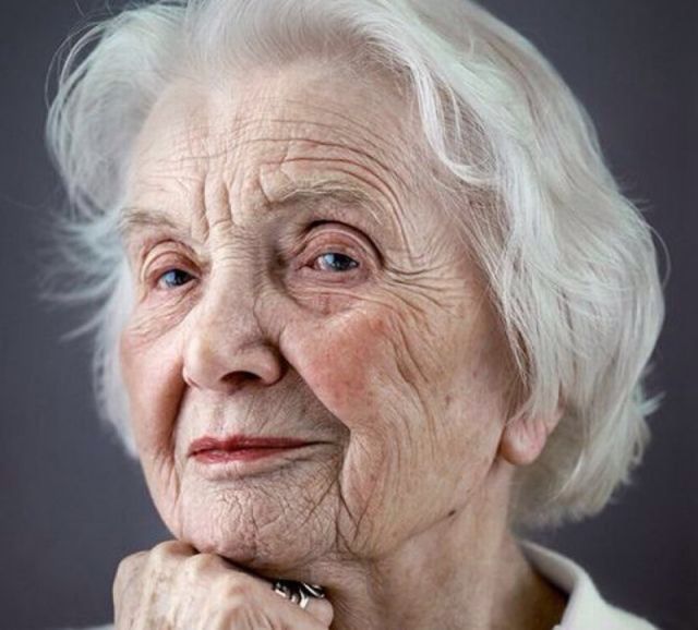 an older woman with white hair and blue eyes is featured on the cover of a book