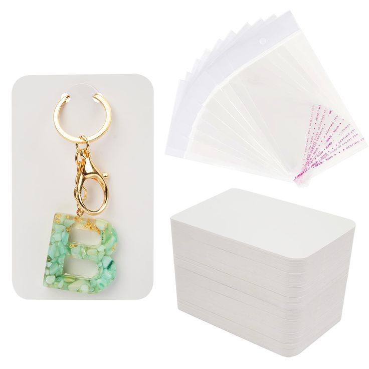 PRICES MAY VARY. Package Include: 100 x Keychain Display Cards, 100 x Self-Sealing Bags. Product Size: Each cards measures 3 x 4.7 in/7.5 x 12 cm, each clear bags measures 3.5 x 5.5 in/9 x 14 cm. Material: Our keychain place cards are made of quality art paper with pre-cut holes, which is not only sturdy, but also not easy to bend and break. These cards are thick enough to be written and not easy for ink to pass through. Unique Design: This keychain card is improved and designed by TEMLUM. We in Business Card Organizer, Keychain Display, Black Keychain, Jewelry Display Cards, Packaging Supplies, Clear Bags, Business Card Holders, Display Cards, Jewelry Holder