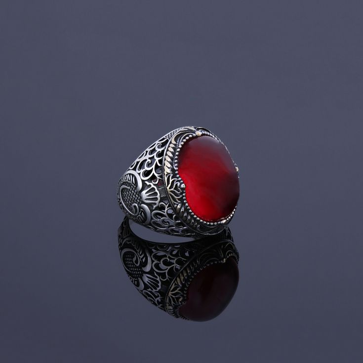 Men's red Ruby statement ring which will give you a head turning presence. This unique, vintage style, engraved 925 Sterling Silver ring has an exquisite design for the polished, refined, and distinguished man. Perfect for casual and formal events, it will make your friends envious as you walk into the room full of confidence and pride and command attention. Looking for a unique, one of a kind GIFT FOR HIM, groomsman gift, father's day gift, teacher day gift? Look no further. This cool gemstone Ruby Ring Designs Unique For Men, Heirloom Red Signet Ring With Polished Finish, Collectible Red Engraved Ring, Formal Red Engraved Ring With Polished Finish, Vintage Red Hallmarked Signet Ring, Red Engraved Signet Ring For Formal Occasion, Red Hallmarked Engraved Ring For Formal Occasions, Formal Red Engraved Signet Ring, Antique Red Gemstone Signet Ring