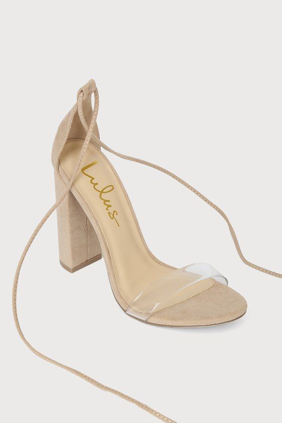 The Lulus Morrina Natural Suede Lace-Up High Heel Sandals are the perfect heels for any occasion! Soft faux suede forms an almond-shaped footbed with a clear vinyl toe strap and a sturdy back heel cup. Two long laces (with shiny gold aglets) wrap and tie around the ankle, all atop a sky-high block heel. 4. 25" wrapped block heel. Cushioned insole. Rubber sole has nonskid markings. Man Made Materials. Imported. Lulus | Morrina Natural Suede Lace-Up High Heel Sandal Heels. Beige Suede Heels With Padded Heel, Beige Suede Heels With Open Heel, Beige Suede Open Heel Heels, Beige Suede Heels With Reinforced Heel, Beige Suede Block Heel, Beige Suede Block Heels, Beige Suede Block Heel Heels, Beige Suede Sandals With Wrapped Heel, Suede Heels With Wrapped Open Heel