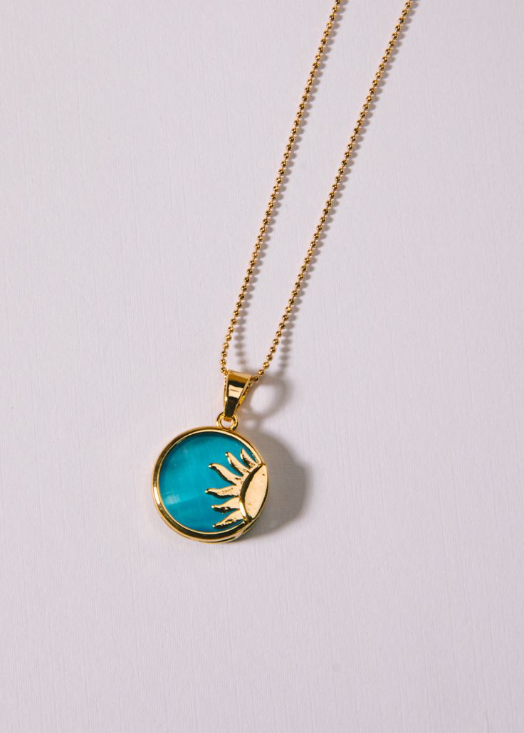 Dainty gold-filled ball chain featuring gold and blue translucent sun. 18" long. Kendra Scott Gold Necklace Blue, Affordable Blue Everyday Necklace, Affordable Blue Everyday Jewelry, Affordable Everyday Blue Jewelry, Cheap Everyday Blue Jewelry, Cheap Blue Everyday Jewelry, Affordable Blue Symbolic Necklace, Blue Sun And Moon Pendant Necklace, Blue Celestial Necklaces With Sun And Moon Design