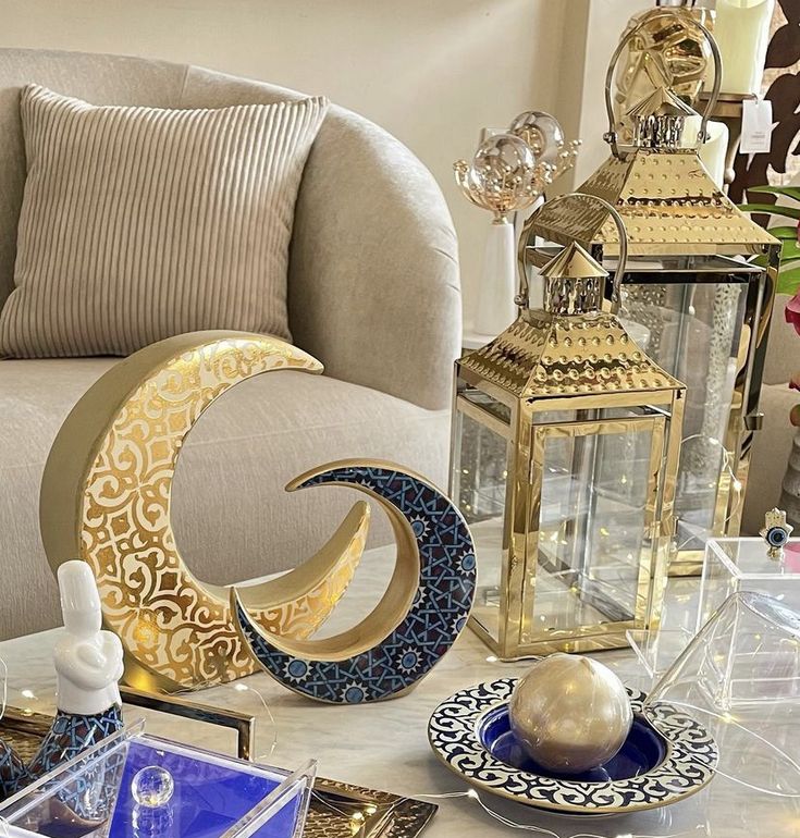 a living room filled with lots of furniture and decor on top of a white table