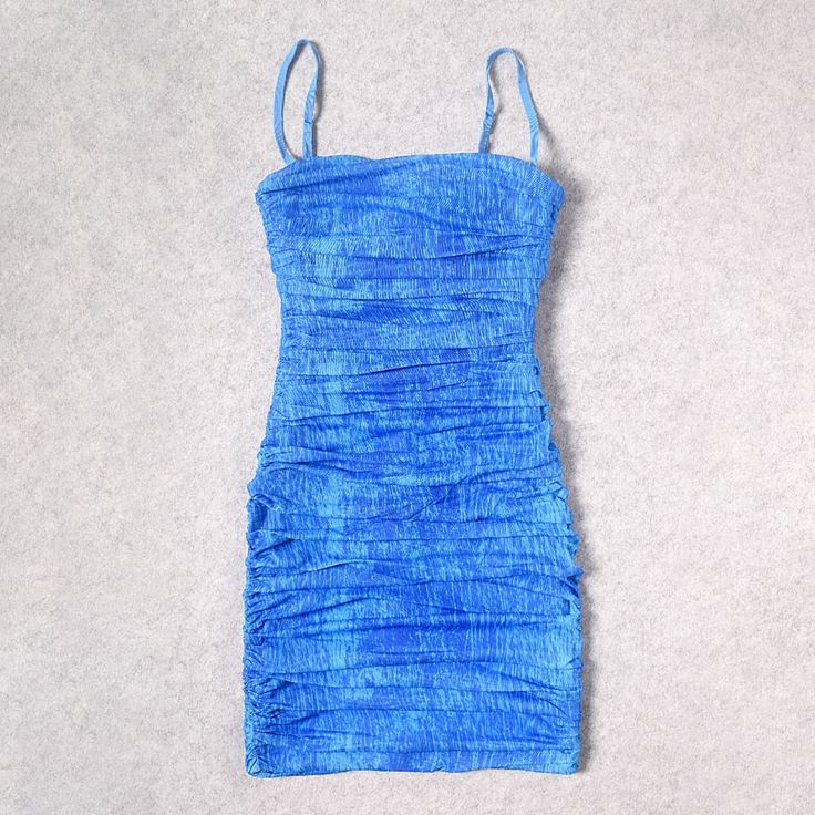 Every fashionista must have a ruched dress in her wardrobe! A short bright dress looks very perky and creates a playful and slightly childish look.We introduce the light and weightless Amani Ruched Tie-Dye Dress.Check out this strappy apparel, crafted from an airy weave that plays with the light.Feminine and, at the same time, comfortable cut hugs your curves while hiding imperfections. Such a dress attracts the attention of others and gives your image playfulness and femininity. Complement with Princess Fairy Dress, Dolly Dress, Bright Dress, Beautiful Figure, Dresses Royal, Wrap Midi Dress, Royal Blue Dresses, Tie Dye Dress, Dyed Dress