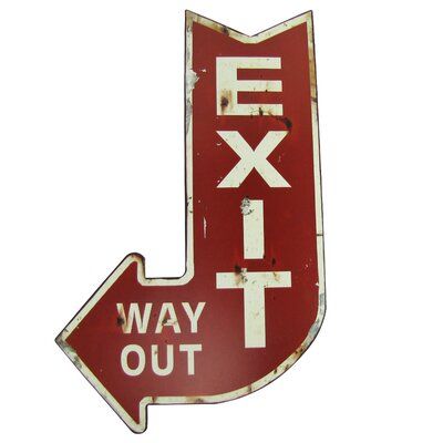 a red sign that says exit way out with an arrow pointing in the opposite direction