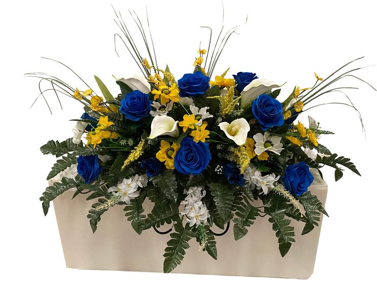 a bouquet of blue roses, white and yellow flowers