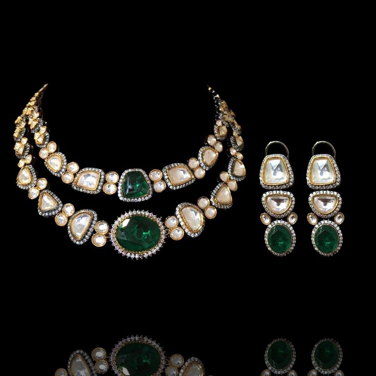 Impeccably flawless layout with ravishing regalia! Delve into a charismatic fantasy with sophistication of kundan and emerald stones to achieve understated elegance. The set includes a necklace and a pair of matching earrings. Approximate earrings length is 1.5". Please click on the video for a detailed view of the product. Designed over high-quality brass as base metal with gold and silver plating. Made by order. Kindly allow 5-7 weeks for the delivery of this item. For custom or urgent request Kundan Sets For Formal Occasions In Temple Jewelry Style, Formal Kundan Jewelry Sets Chandbali Style, Formal Kundan Jewelry Sets With Chandbali Design, Traditional Emerald Kundan Necklace For Formal Occasions, Elegant Emerald Kundan Necklace With Stone Work, Festive Kundan Emerald Necklace For Receptions, Green Kundan Necklace For Formal Occasions, Elegant Kundan Necklace With Emerald Stone Work, Formal Temple Jewelry Kundan Necklace With Matching Earrings