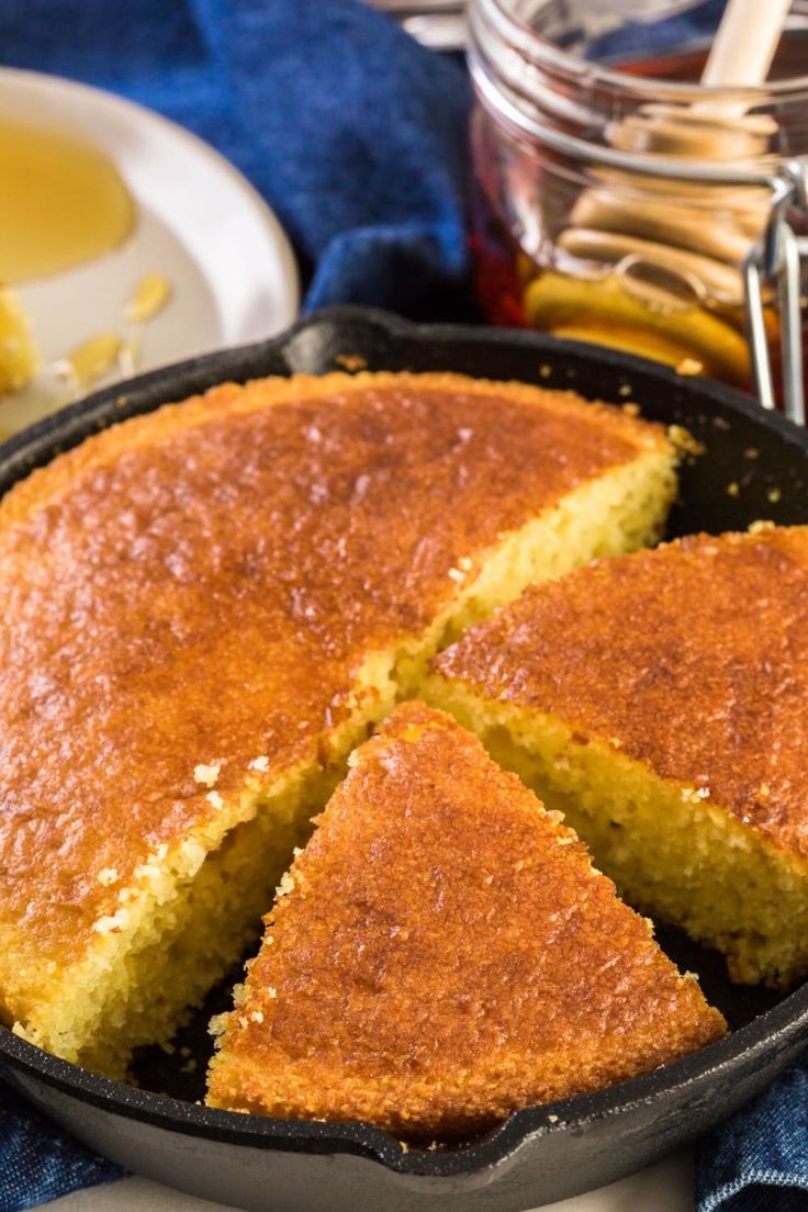 a cake in a pan with slices cut out