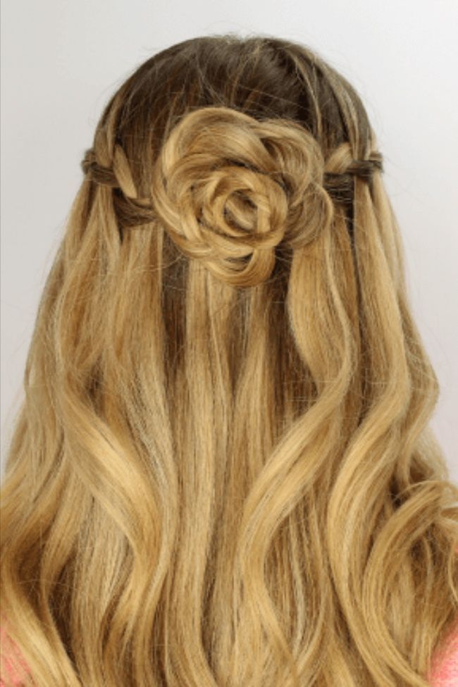 half of hair in a flower type of shape and rest of hair out. if you have long hair than you should try this hair style Wedding Hair Roses, Flower Bun Hairstyle, Half Up Half Down Hoco Hair, Rose Braid, Flower Bun, Flower Braids, Braided Bun Hairstyles, Waterfall Braid, Bun Hairstyle