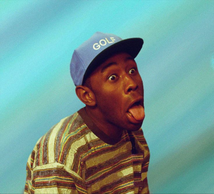 a man sticking his tongue out in front of a blue background with the word golf on it