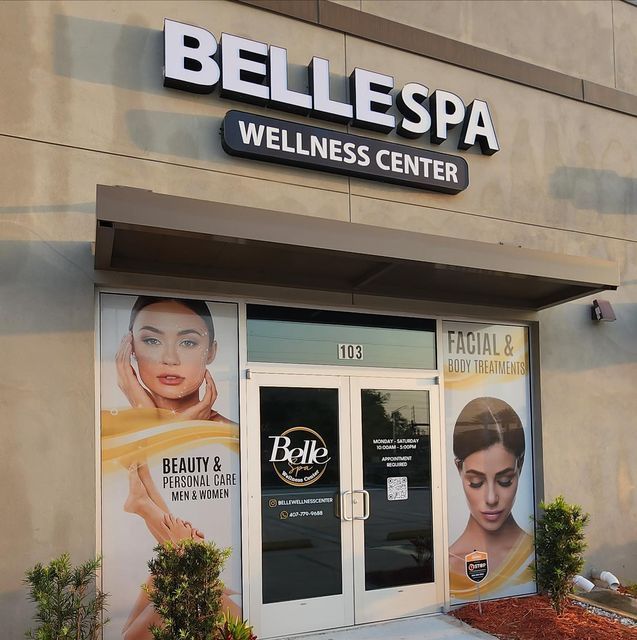 the front entrance to a well - lit beauty salon