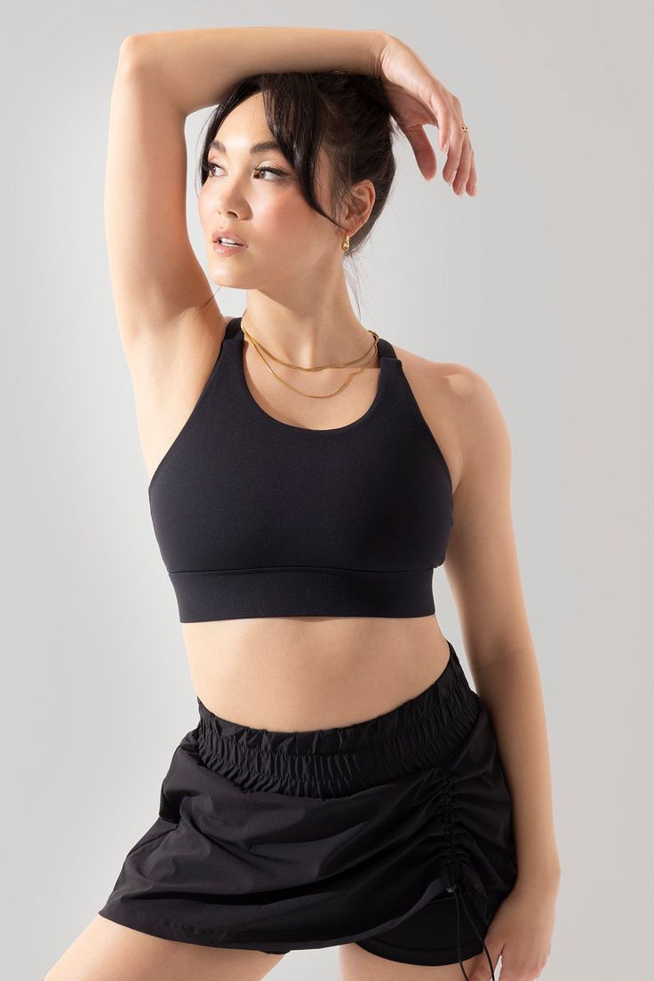 Your movement could use support. Meet the not-so basic sports bra designed to bring comfort to your next Pilates session. Everyday Compressive Sports Bra With Built-in Bra, Supportive Activewear With Built-in Bra For Everyday, Versatile Sports Bra For Gym, Gym Activewear With Built-in Bra And Minimal Stretch, Versatile Gym Sports Bra With Go-dry Technology, Versatile Go-dry Sports Bra For Gym, Black Sports Bra With Built-in Bra And Minimal Stretch, Supportive Seamless Everyday Activewear, Supportive Seamless Activewear For Everyday