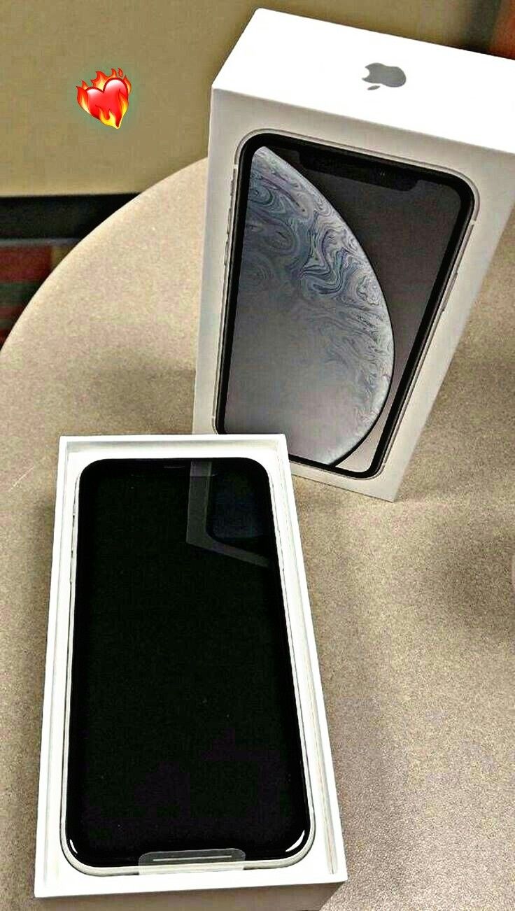 an apple iphone xr box sitting on a table next to it's packaging