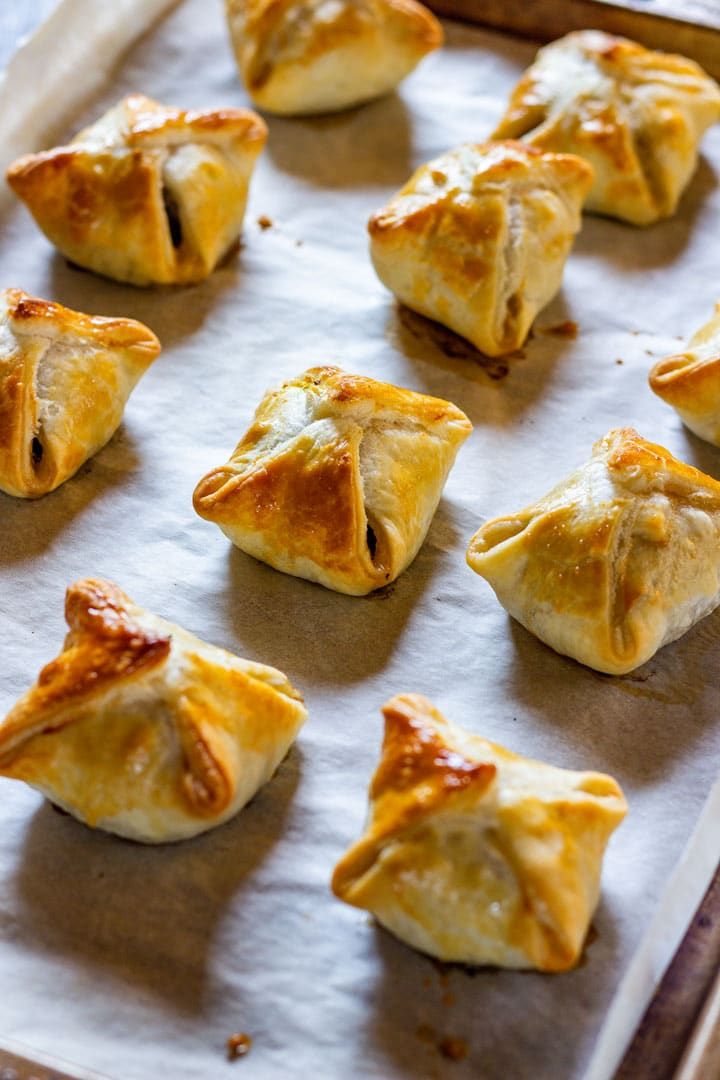 baked pastries on a baking sheet ready to go into the oven