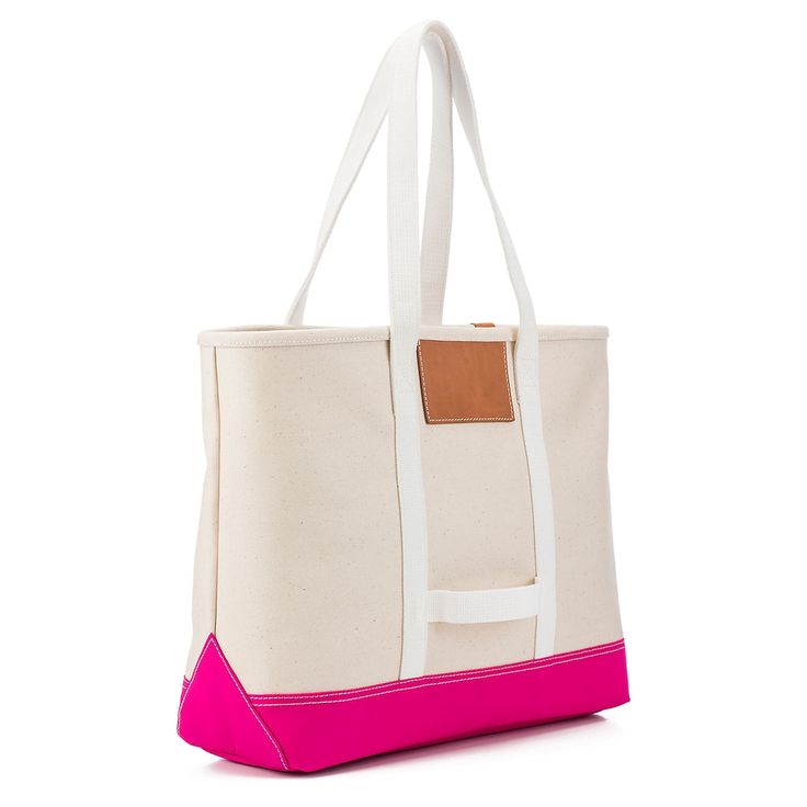 This versatile pink tote is perfect for everyday use as well as for travel & features dual straps, an open top, and Italian vegetable tanned leather accents It's extremely durable since it's made from a thick, natural canvas which is then coated in a waster-resistant finish. The bottom of the bag is also protected additionally with nylon Measures 15" x 13" x 5" *Custom monogram is ink stamped in gold. As an FYI, there's a max. 2 letter count **Please allow 3 weeks lead time since it's made-to or Rectangular Canvas Weekender Bag With Canvas Lining, Canvas Weekender Bag With Canvas Lining For Shopping, Functional Pink Leather Bags, Pink Canvas Tote Bag With Leather Handles, Pink Canvas Bag With Leather Handles For Daily Use, Daily Use Canvas Bag With Reinforced Handles, Canvas Tote Bag With Reinforced Handles, Canvas Bag With Reinforced Handles For Daily Use, Pink Canvas Shopping Bag