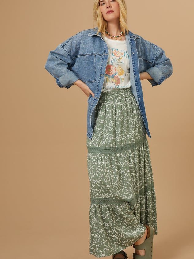 Embrace bohemian style with this flowy floral maxi skirt. The delicate floral print adds a touch of femininity and romance, while the smocked elastic waistband ensures a comfortable and flattering fit. The intricate lace details add a touch of luxury and make this skirt perfect for any occasion. Floral Dresses Outfit, Long Fall Skirts, Edgy Floral Outfits, Cardigan With Maxi Skirt, Flowy Feminine Style, Patterned Maxi Skirt, Modest Bohemian Outfits, Dress With Shacket, Mennonite Fashion