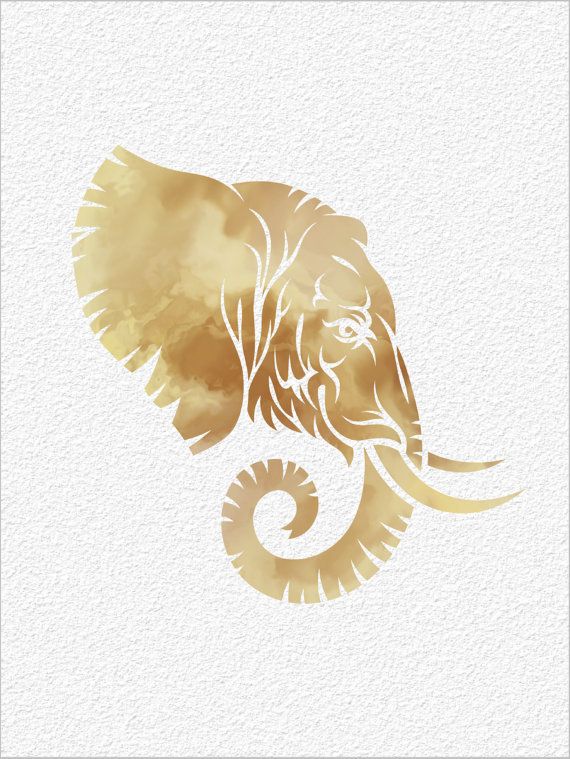 an elephant's head painted in gold on white paper with watercolors and ink