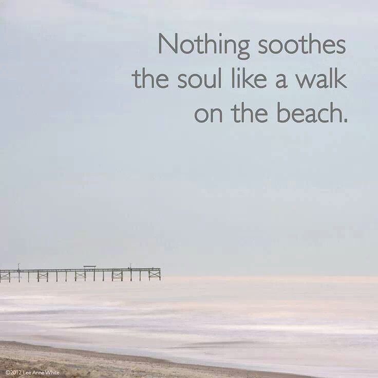 a person walking on the beach with a quote about nothing soothes the soul like a walk on the beach