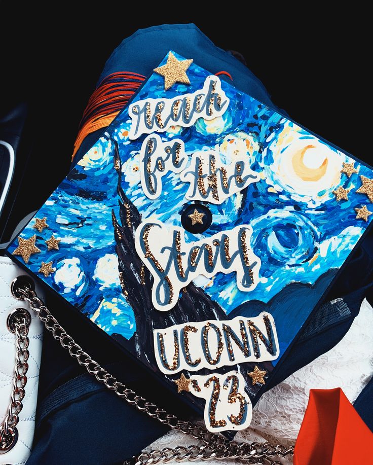 a graduation cap with the words reach for the star upon it