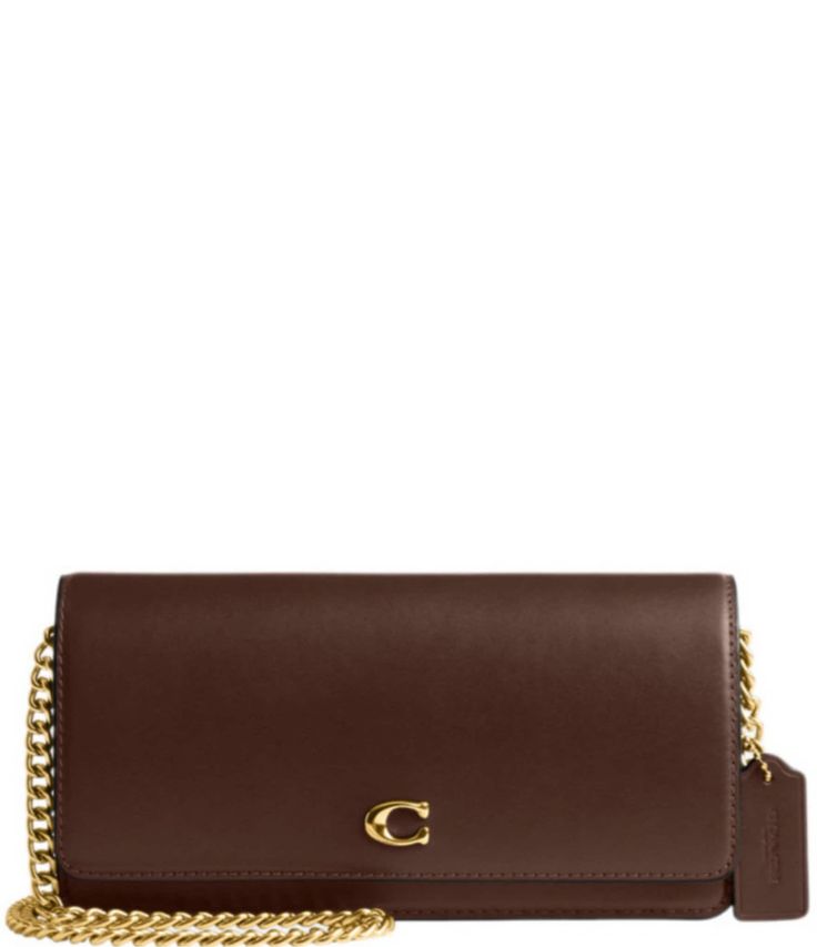 From COACH&#x2C; the Evie Long Wallet with Chainfeatures:Refined calf leatherSix credit card slotsInside zip and open pocketsSnap closureOutside slip pocketDetachable chain strap with approx. 21.5" drop for shoulder or crossbody wearApprox.: 8" (L) x 4" (H) x 1.75" (W)Imported. Coach Classic Rectangular Wallet On Chain, Classic Coach Wallet On Chain, Coach Luxury Wallet On Chain For Formal Occasions, Classic Brown Wallet On Chain With Chain Strap, Classic Brown Wallet On Chain, Luxury Coach Wallet On Chain For Formal Occasions, Elegant Coach Wallet On Chain For Formal Occasions, Coach Leather Wallet On Chain For Everyday Use, Coach Leather Wallet On Chain With Chain Strap