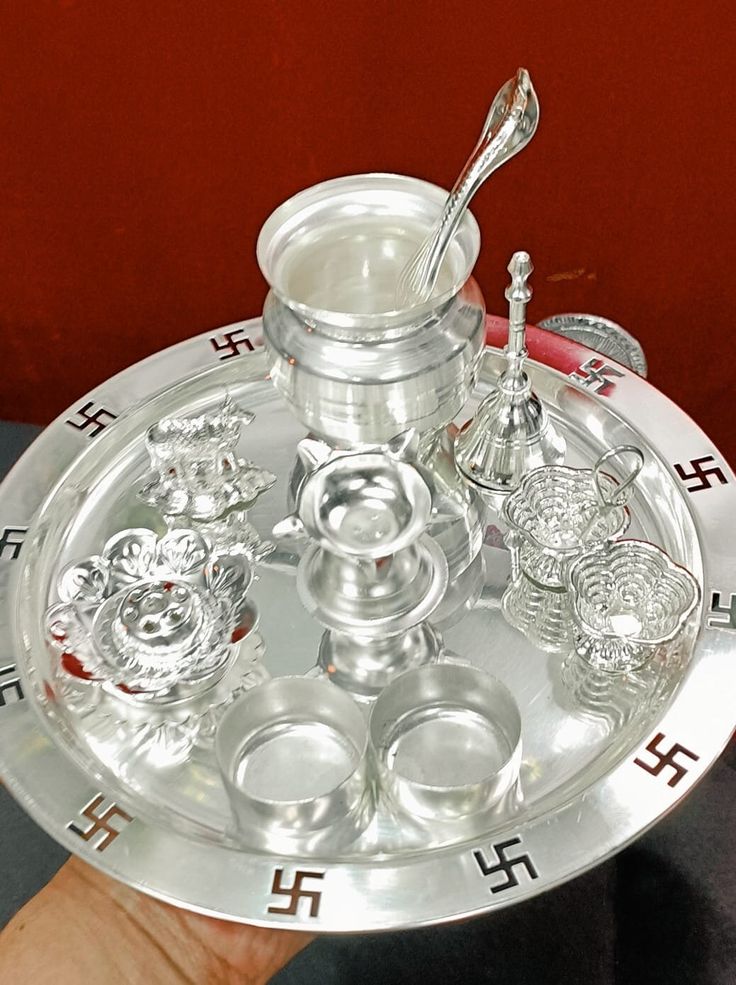 "Style 1 red velvet bag  silver plated pooja thali set  15 pc set  thali size 10\" style 2  red velvet bag  sliver plated puja thali set thali size 8.5 \" set of 8pc  style 3  red velvet bag  silver plated puja thali set  thali size 9.5\" set of 10 pc" Silver Bollywood Ceremonial Sets, Silver Bollywood Style Ceremonial Sets, Silver Bollywood Sets For Ceremonial Occasions, Traditional Silver Sets For Navratri, Ceremonial Meenakari Sets For Navratri, Ceremonial Meenakari Sets For Festivals, Navratri Meenakari Ceremonial Sets, Ceremonial Sets With Meenakari For Festivals, Ceremonial Festive Sets With Meenakari