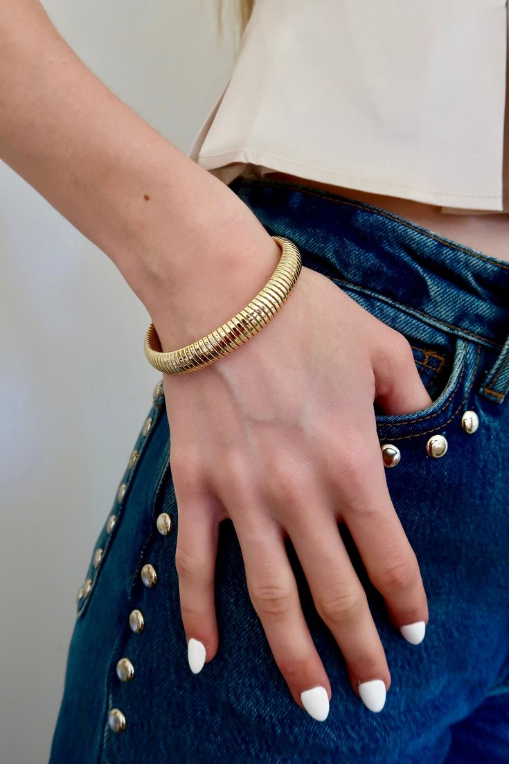 Elevate any outfit with our chic Snake Stretch Bracelet. Made with 10KT dipped brass, it effortlessly adds a touch of fun and sophistication to your look. The flexible design ensures a comfortable fit, making it the perfect accessory for any occasion. Brass dipped in 10K Gold 2.25" Inner Diameter Weight 18.87g Flexible Design, 10k Gold, Stretch Bracelet, Stretch Bracelets, Gold Bracelet, Comfort Fit, Brass, Bracelet, Gold