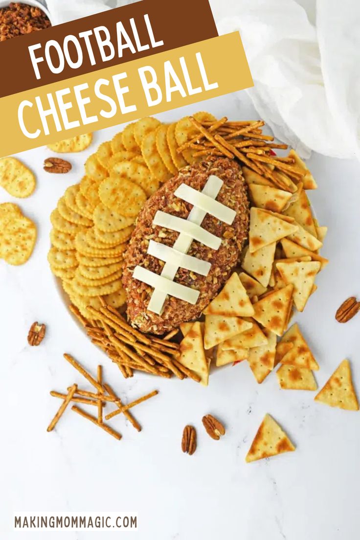 a football cheese ball on top of crackers