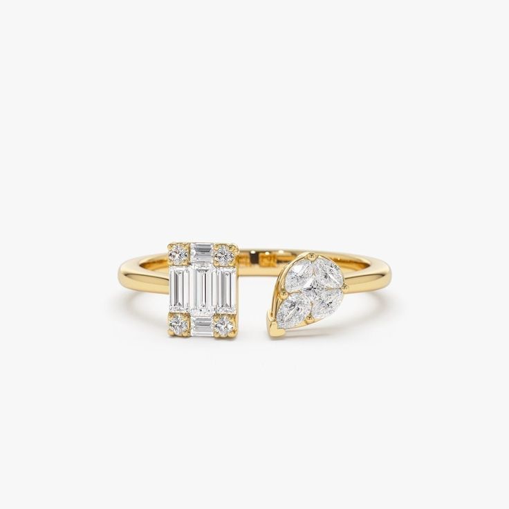 a gold ring with an emerald cut diamond