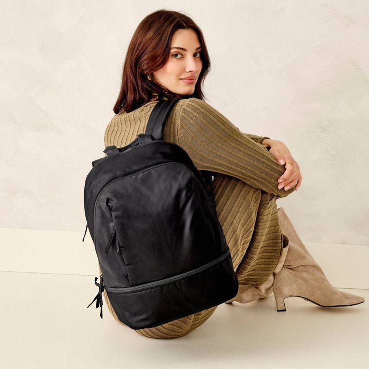 Discover the perfect blend of style and functionality with our Chancery Backpack. Designed for the modern woman on the go, this versatile backpack offers the convenience and storage capacity of a backpack with the stylish and sophisticated look of a purse, making it the ideal accessory for work, travel and everyday use. Upgrade your daily carry with our Chancery Backpack. Whether you're heading to the office, traveling (it has a trolley sleeve!) or running errands, our backpack offers the perfec Versatile Nylon Leather Backpack For Travel, Everyday Nylon Backpack With Removable Pouch, Modern Nylon Backpack For Everyday Use, Versatile Nylon Backpack For Everyday Use, Versatile Everyday Nylon Backpack, Trendy Nylon Backpack For Commuting, Versatile Nylon Backpack, Versatile Leather Backpack For Commuting, Modern Nylon Leather Backpack With Zipper