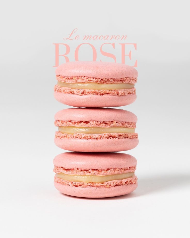 three pink macaroons stacked on top of each other with the words la meran rose written above them