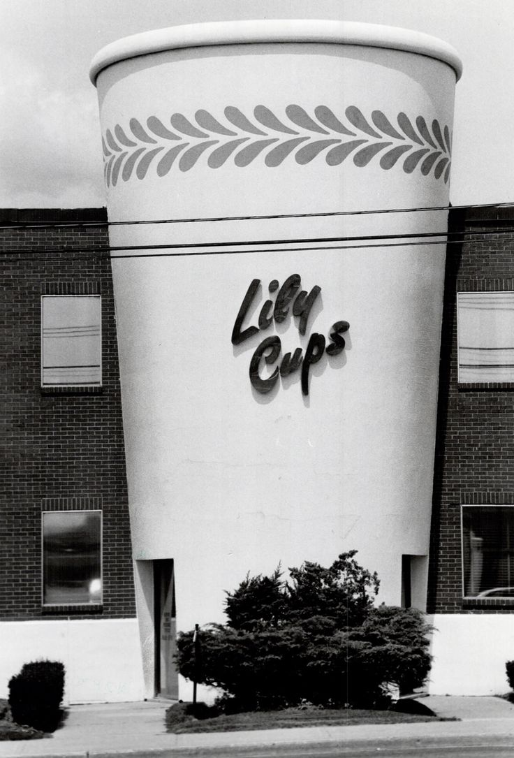 an old photo of a life cup store