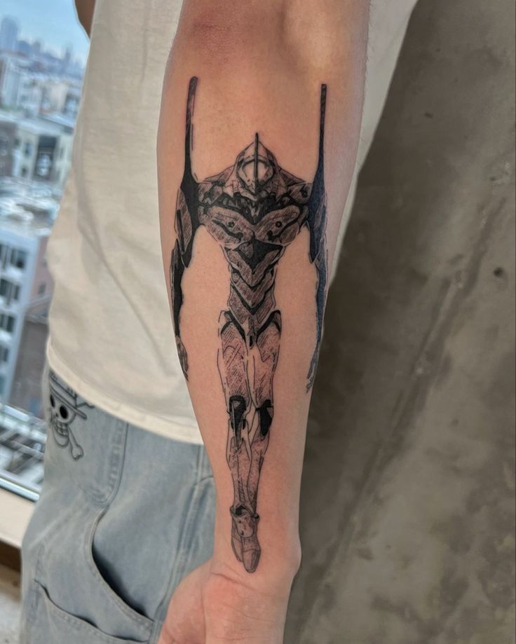 a man with a tattoo on his arm that has a bull's head in the center