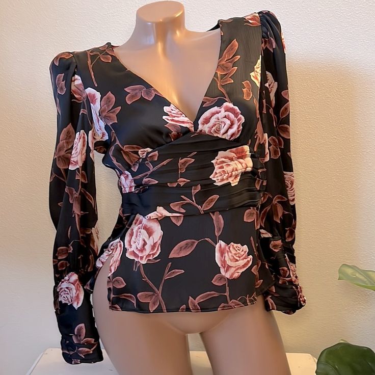 Nwt Zara Floral V Neck Blouse. Long Sleeve Gathered Ruched Mid Section And Cuffs. Small Shoulder Pads. Side Zipper. Sheer, Detailed Buttons On Cuffs. Very Slimming. Satin Like Material. 100% Polyester. Size Is Xs. Excellent Condition Chic Floral Print Tops For Party, Fitted Party Tops With Rose Print, Chic Floral Print Tops For Night Out, Flirty Fitted V-neck Blouse, Party V-neck Blouse With Floral Print, Fitted Floral Print Top For Party, Fitted Floral Print Blouse For Night Out, Feminine Floral Print Blouse For Night Out, Feminine Floral Print Tops For Night Out