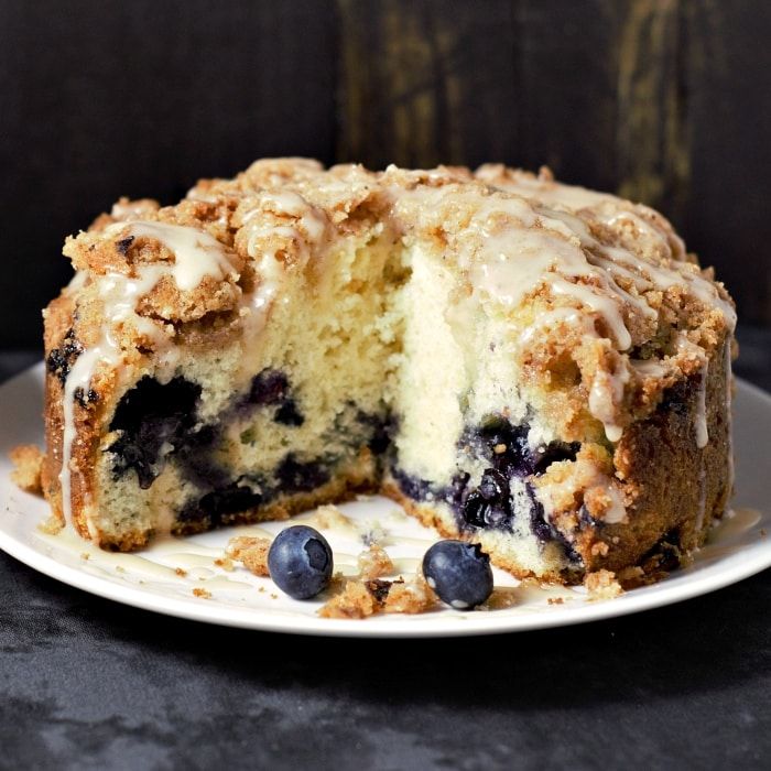 a blueberry crumb cake on a white plate