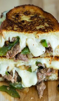 a grilled cheese sandwich with meat and green peppers