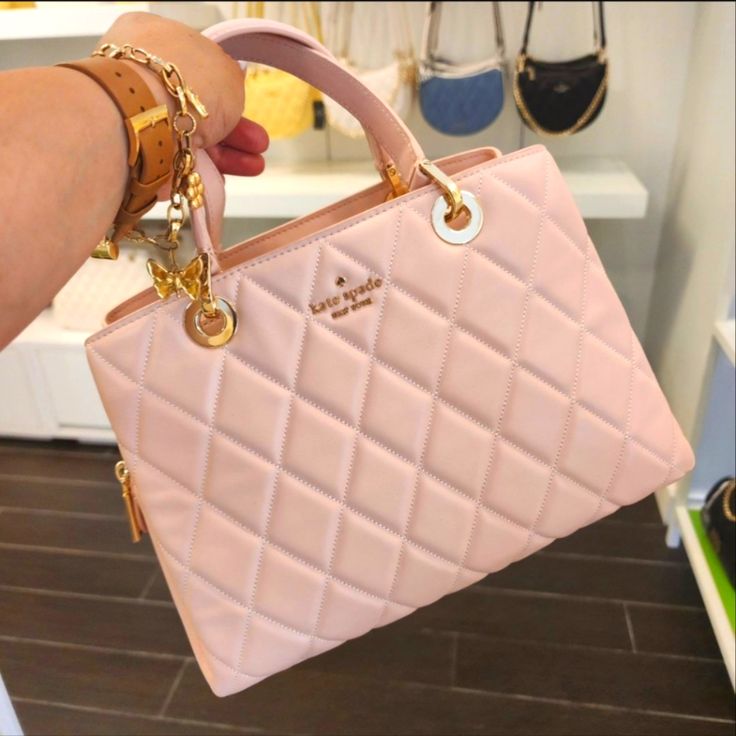 Nwt Kate Spade Kh227 Carey Quilted Sullivan Satchel Crossbody In Rose Smoke Style Number Kh227 Measurements Length: 5.6" Height: 8.0" Width: 5.3937" 10.8"W At Bottom, 9.6"W At Top Materials Smooth Quilted Leather Two Way Script Logo Lining Handle 4.25" Strap 22" Features Interior Back Slip Pocket Metal Pinmount Logo Dust Bag Included: No Luxury Pink Everyday Satchel, Pink Kate Spade Satchel Bag, Light Pink Kate Spade Purse, Kate Spade Pink Bag With Top Carry Handle, Rectangular Pink Kate Spade Bag, Kate Spade Bag Pink, Kate Spade Purse Pink, My Shopping List, Pink Purse