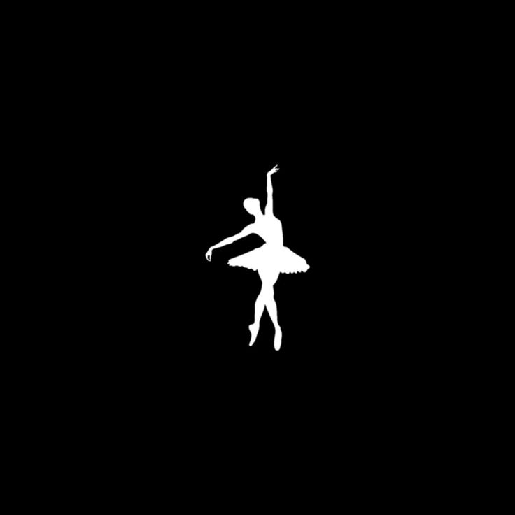 a ballerina silhouetted against a black background