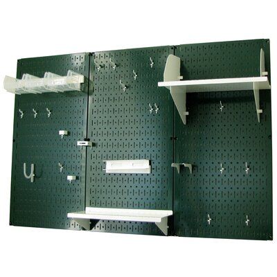 the pegboard is green and has white shelves on each side with hooks for hanging items