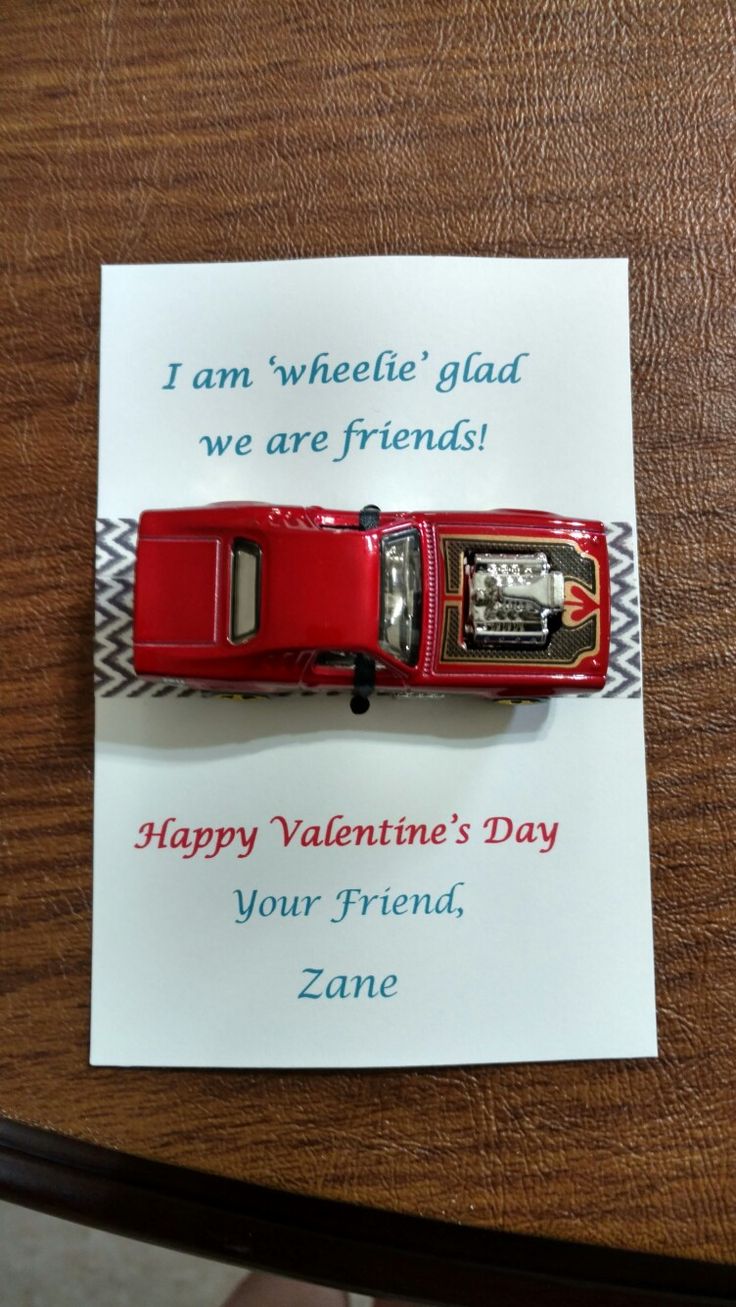 a valentine's day card with a red car on it and the words, i am wheelie glad we are friends happy valentine's day your friend