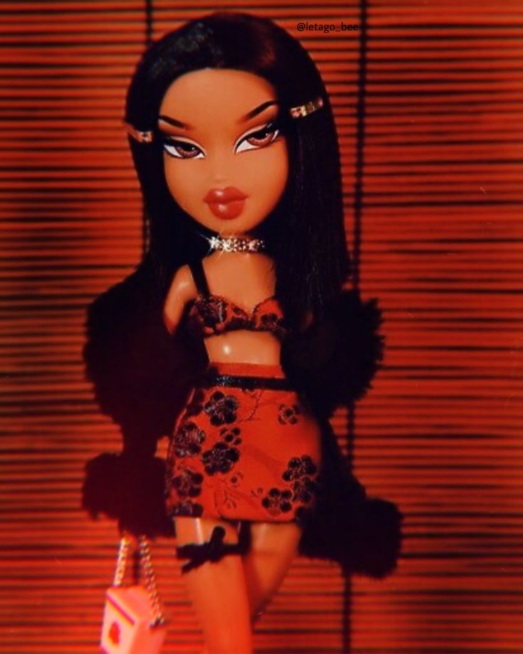 an image of a doll that is wearing a dress and holding a handbag in front of a red background