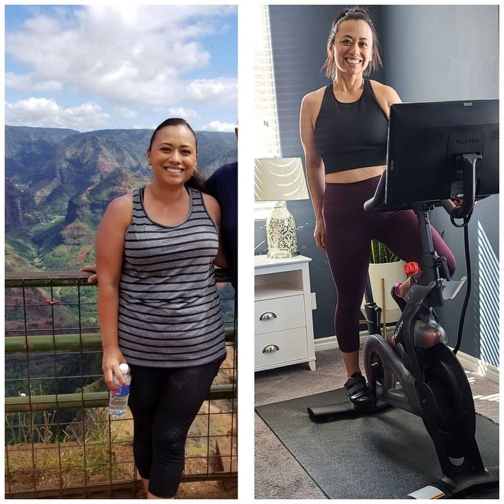 two women standing next to each other in front of an exercise bike and smiling at the camera